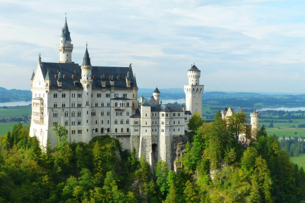 Neuschwanstein Castle – Germany’s Fairytale Fortress Neuschwanstein Castle perched on a mountain in southern Germany